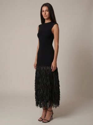 Robe femme noire col montant franges longues midi